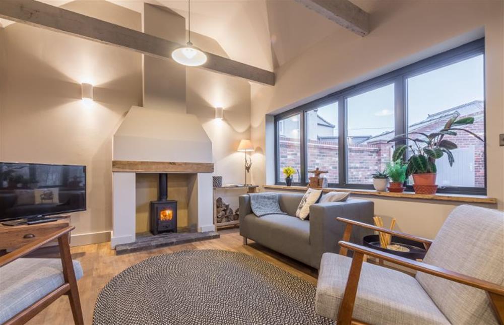 Ground floor: The sitting room has cosy wood burning stove