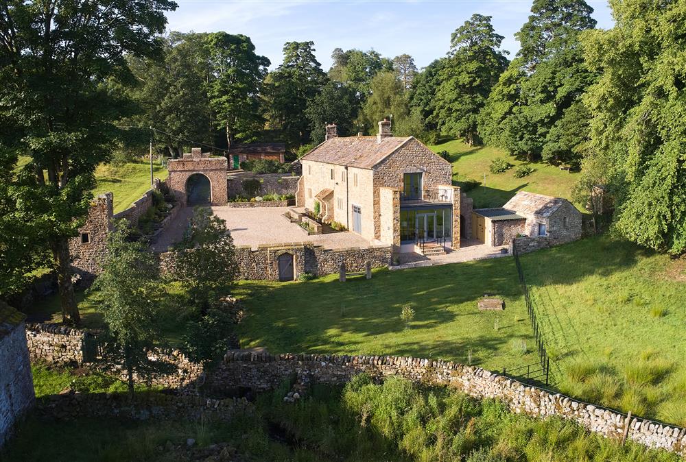 Aerial view of the large, private garden at The Old Buttress at Rotherhope Towers, Alston