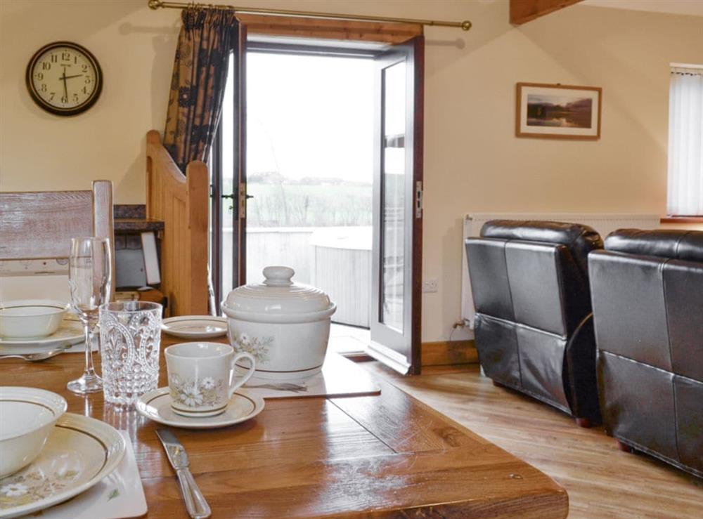 Light and airy dining space at The Old Byre in Dearham, near Maryport, Cumbria