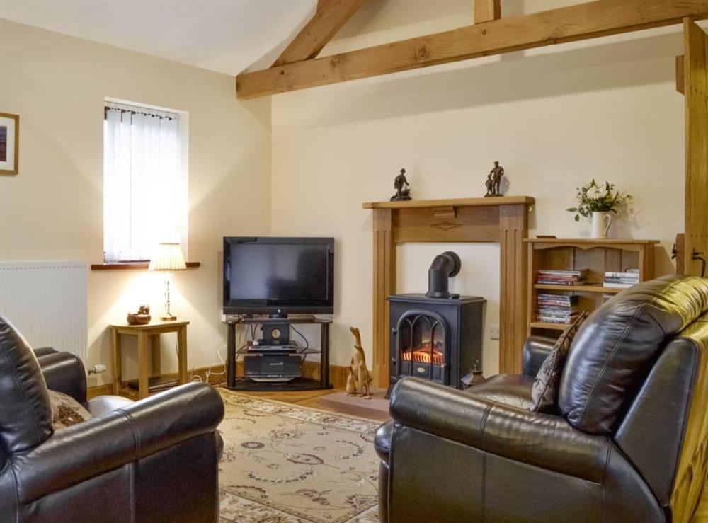 Welcoming living area at The Old Byre in Dearham, near Maryport, Cumbria