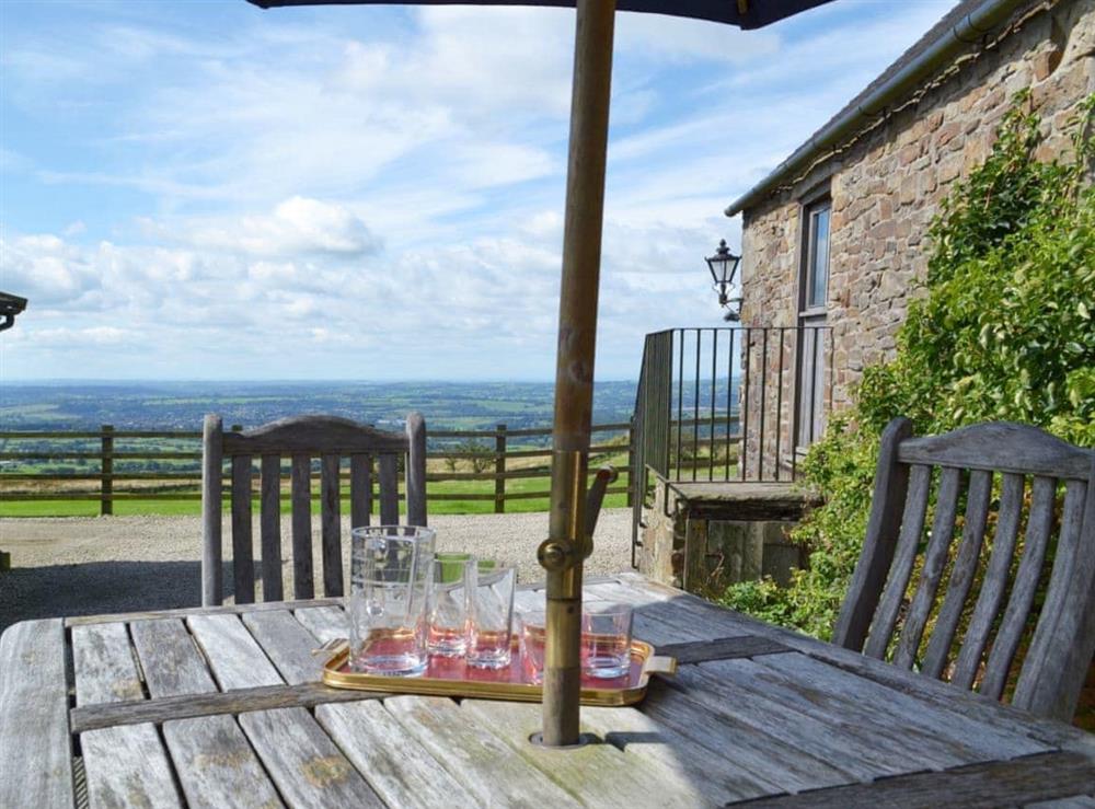 Outdoor eatinga rea with great views over the surrounding countryside at The Old Byre in Thorncliffe, Leek, Staffs., Staffordshire