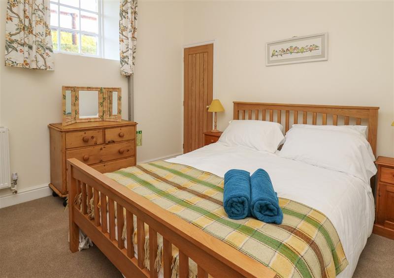 One of the 5 bedrooms at The Old Carriage Court, Kidwelly