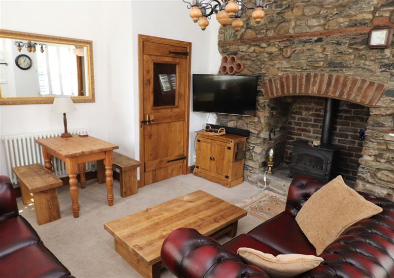 Relax in the living area at The Old Carriage House, Clappersgate