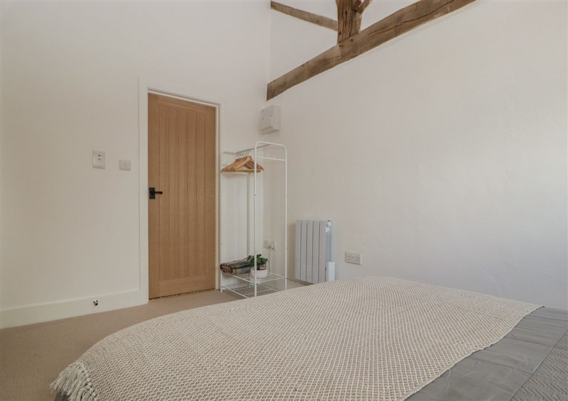 A bedroom in The Old Cart Shed at The Old Cart Shed, Gorsley
