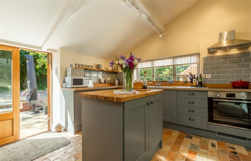 Ground Floor: French doors from the kitchen to patio area at The Old Chapel, Great Walsingham