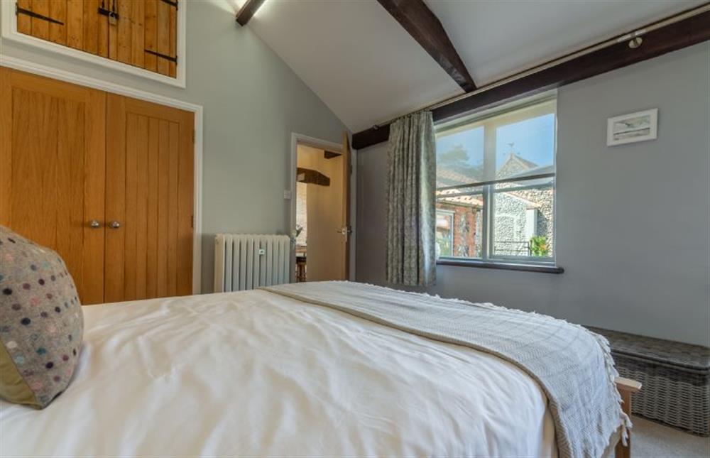 Ground Floor: Master bedroom with double wardrobe at The Old Chapel, Great Walsingham