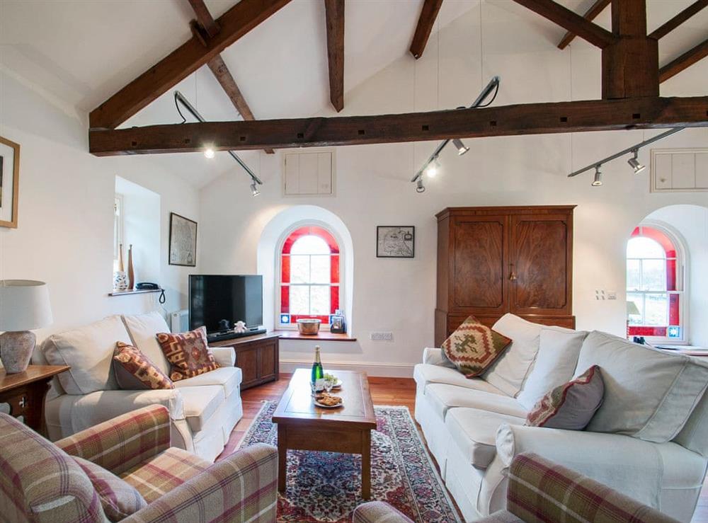 Warm and welcoming living area at The Old Chapel in Horsehouse, near Leyburn, North Yorkshire