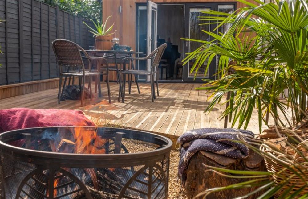 Fire pit and barbecue tree stump seating at The Old Chapel, Pentney near Kings Lynn