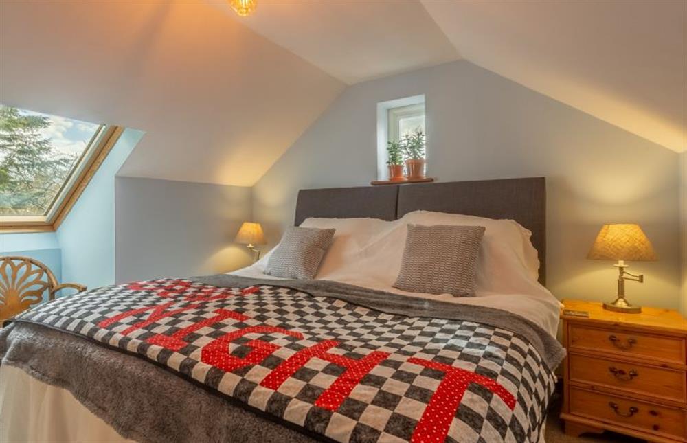 First floor: Bedroom two with a super-king size bed at The Old Chapel, Pentney near Kings Lynn