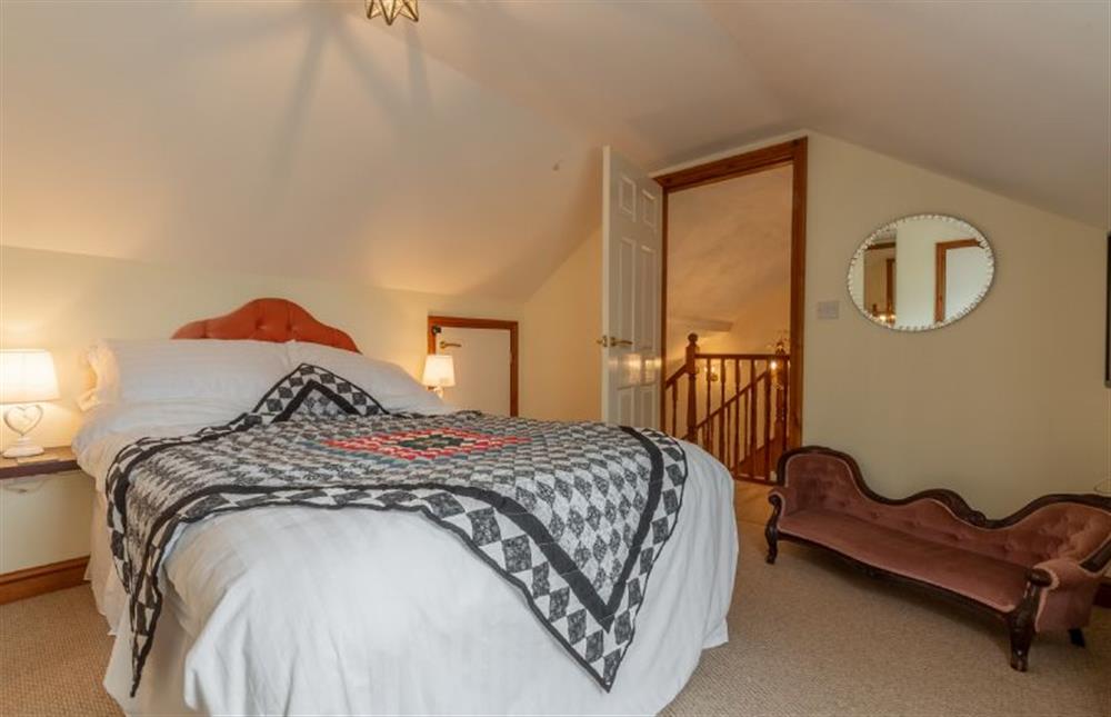 First floor: Master bedroom with double bed at The Old Chapel, Pentney near Kings Lynn