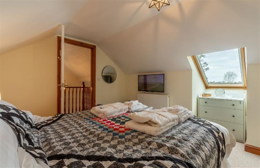 First floor: Master bedroom with slippers, dressing gowns included at The Old Chapel, Pentney near Kings Lynn