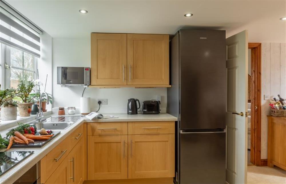 Ground floor: Kitchen and dining area with french doors to garden at The Old Chapel, Pentney near Kings Lynn