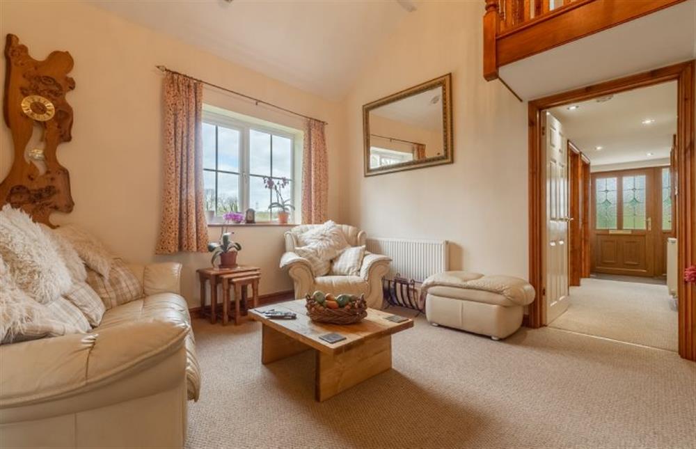 Ground floor: Two sets of stairs from the sitting room each leading to their own bedrooms at The Old Chapel, Pentney near Kings Lynn