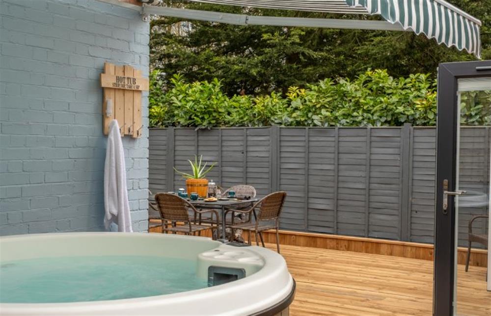 Hot tub with electric canopy over (photo 2) at The Old Chapel, Pentney near Kings Lynn