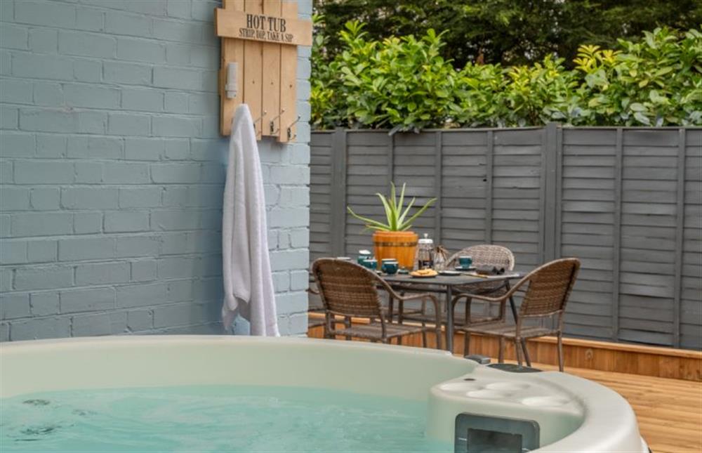 Hot tub with electric canopy over at The Old Chapel, Pentney near Kings Lynn