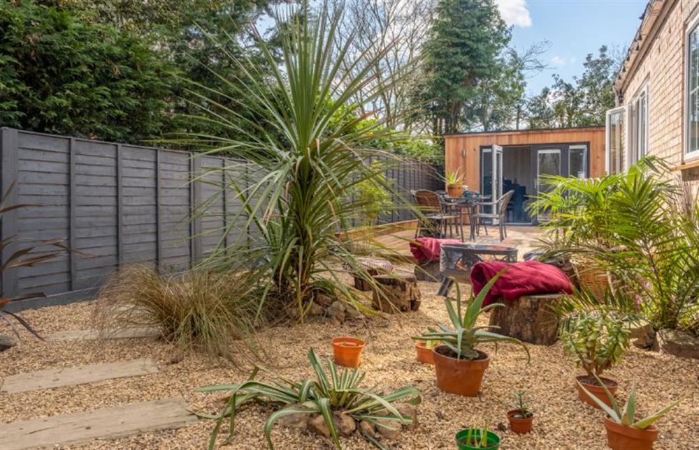 The tropical seating area around the fire pit at The Old Chapel, Pentney near Kings Lynn