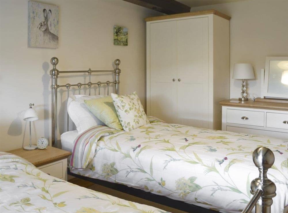Relaxing twin bedroom at The Old Chapel in Thoralby, near Leyburn, North Yorkshire