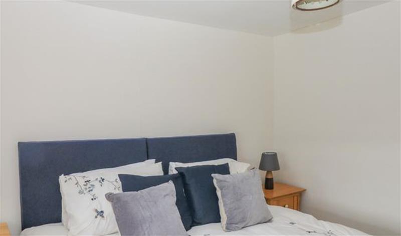 One of the 3 bedrooms at The Old Cider Cellar, Awliscombe near Honiton