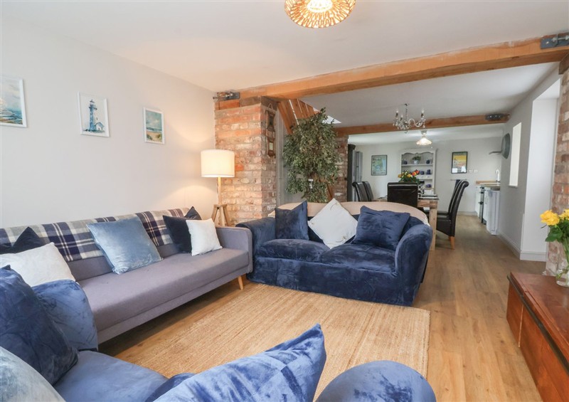 This is the living room at The Old Coach House at The Vicarage, Mappleton near Hornsea