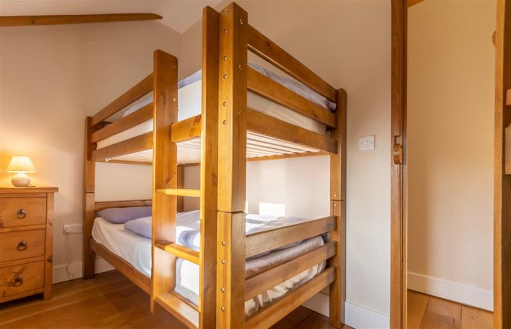 First floor: Bedroom four, bunk room at The Old Coach House, Brancaster Staithe near Kings Lynn