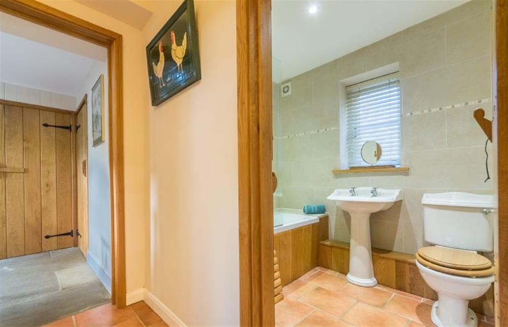 Ground floor: Hallway and Bathroom with shower over at The Old Coach House, Brancaster Staithe near Kings Lynn
