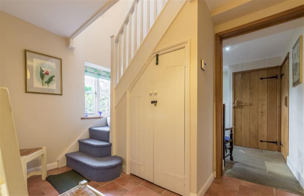 Ground floor: Hallway and stairs to first floor at The Old Coach House, Brancaster Staithe near Kings Lynn