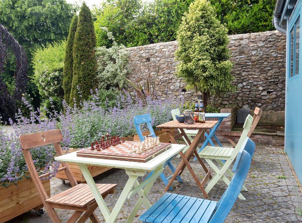 Relaxing outdoor seating area at The Old Coach House in Colyton, near Honiton, Devon