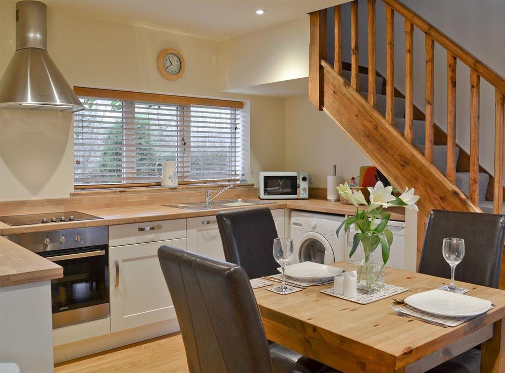 Open plan dining area & kitchen (photo 2) at The Old Coach House in Driffield, North Humberside
