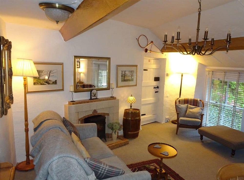 Comfortable living/ dining room at The Old Coach House in Grasmere, Cumbria