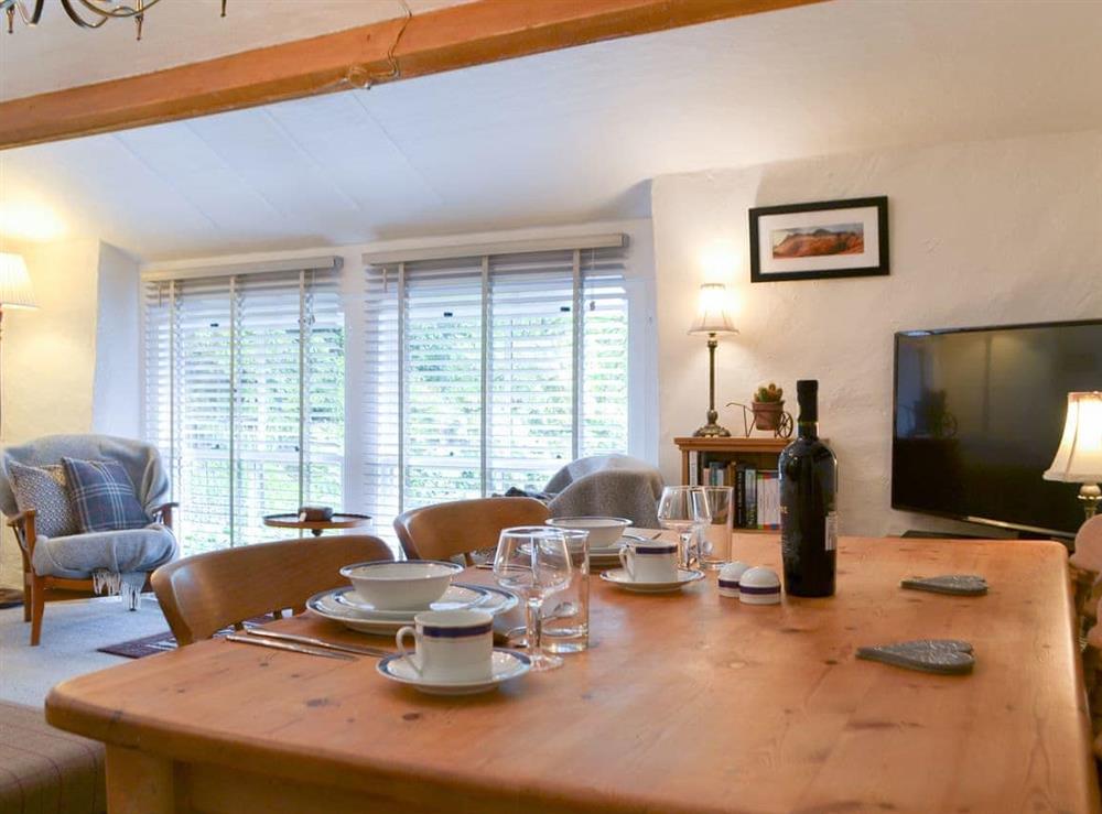 Light and airy living/ dining room (photo 3) at The Old Coach House in Grasmere, Cumbria