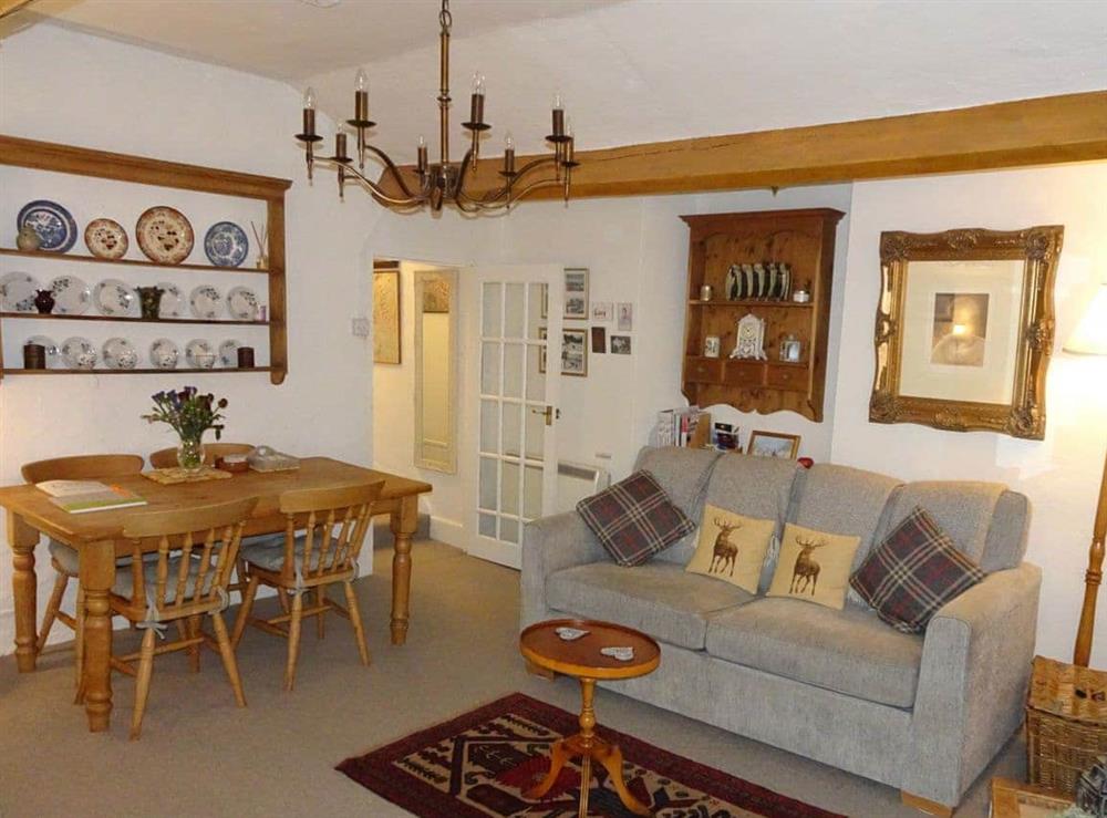 Well presented living/ dining room at The Old Coach House in Grasmere, Cumbria