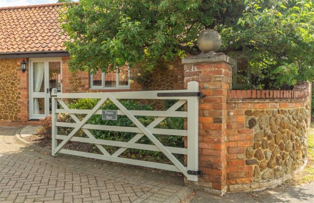 Entrance gate at The Old Cow Shed, Pott Row near Kings Lynn