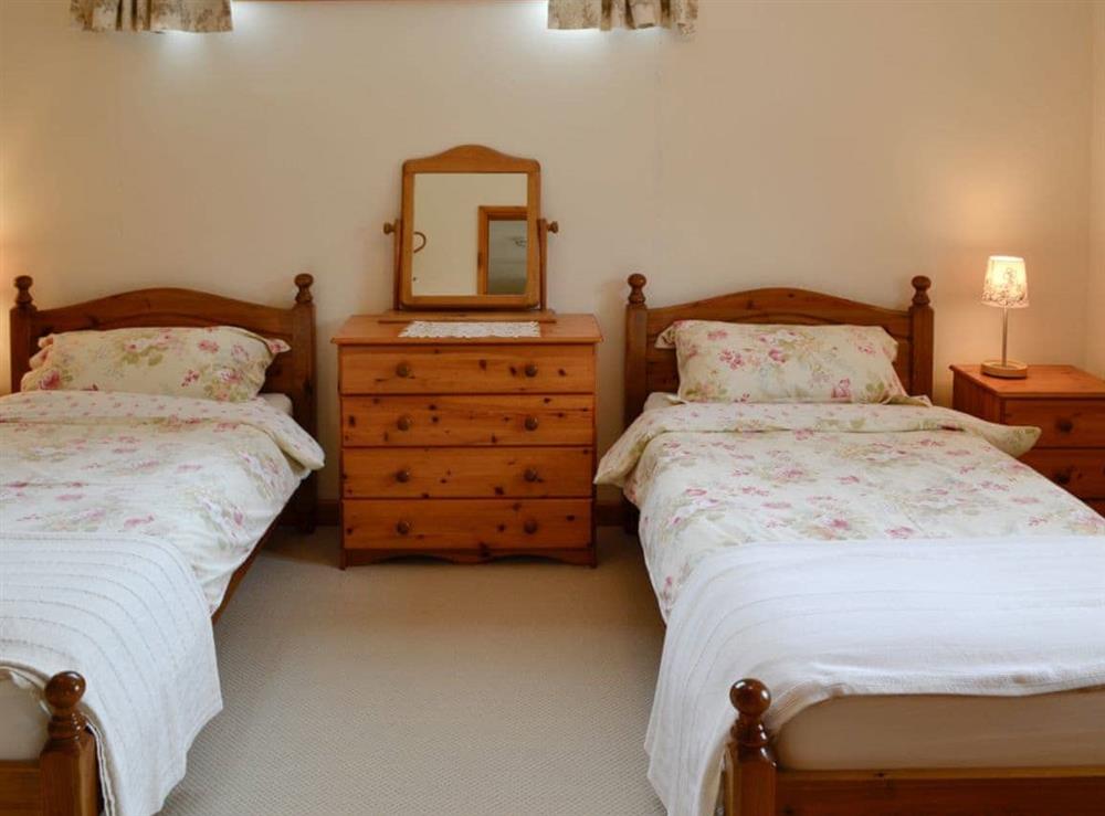 Twin bedroom at The Old Cowshed in Whitney Bottom, Ilminster, Somerset