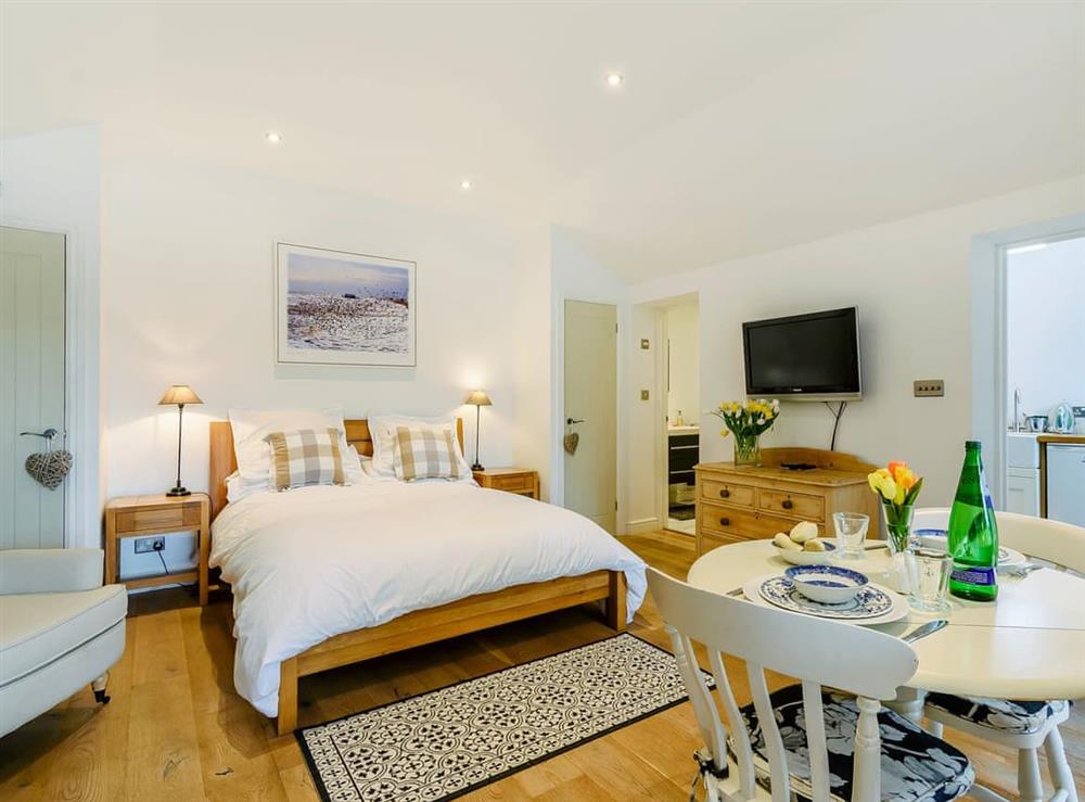 Comfortable living and bedroom area at The Old Dairy At Wootton in East Chiltington, East Sussex