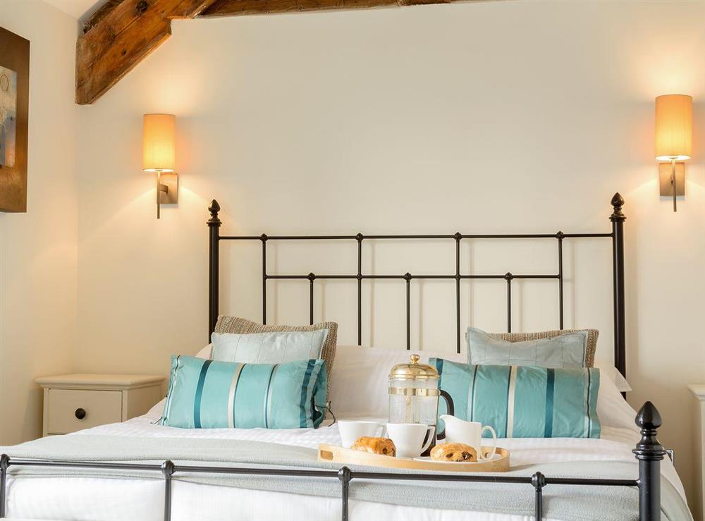 Comfortable double bedroom at The Old Dairy in Cam, near Dursley, Gloucestershire, England