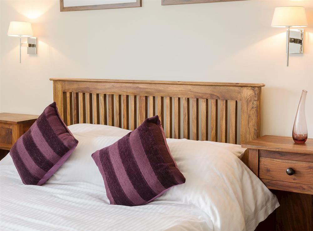 Cosy double bedroom at The Old Dairy in Cam, near Dursley, Gloucestershire, England