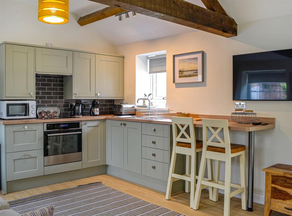 Kitchen area at The Old Dairy Cottage in Ainstable, near Carlisle, Cumbria