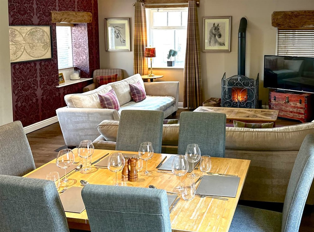 Living room/dining room at The Old Dairy in Foolow, near Hope Valley, Derbyshire