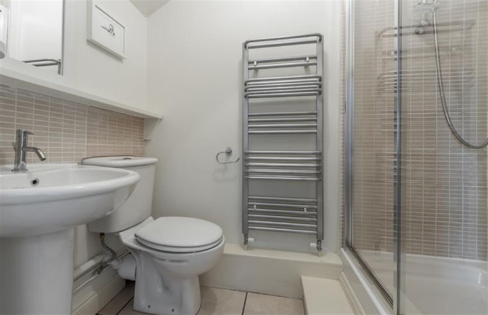 First floor: Bedroom two en-suite with double shower at The Old Dairy, Great Bircham near Kings Lynn
