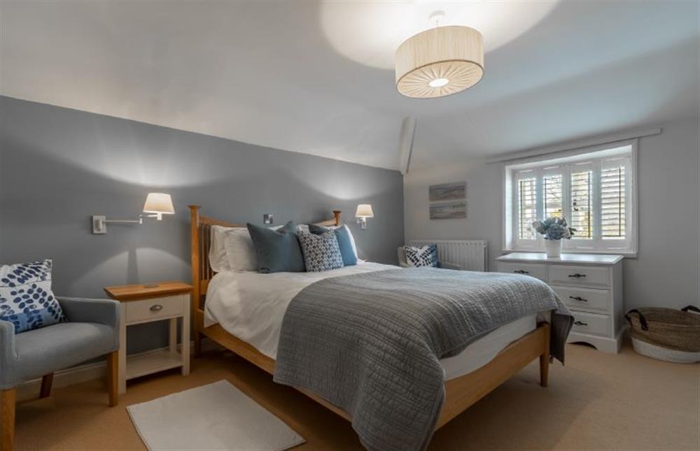 First floor: Bedroom two has a super-king size bed which can also be offered as a twin at The Old Dairy, Great Bircham near Kings Lynn