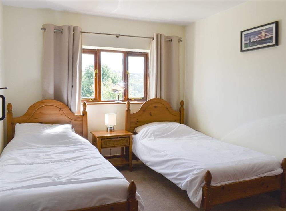 Comfortable twin bedroom at The Old Dairy in Thorncombe, near Broadwindsor, Dorset, England