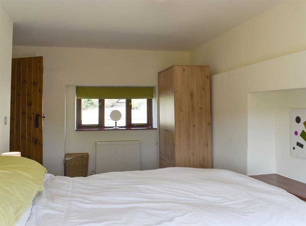 Peaceful double bedroom at The Old Dairy in Thorncombe, near Broadwindsor, Dorset, England