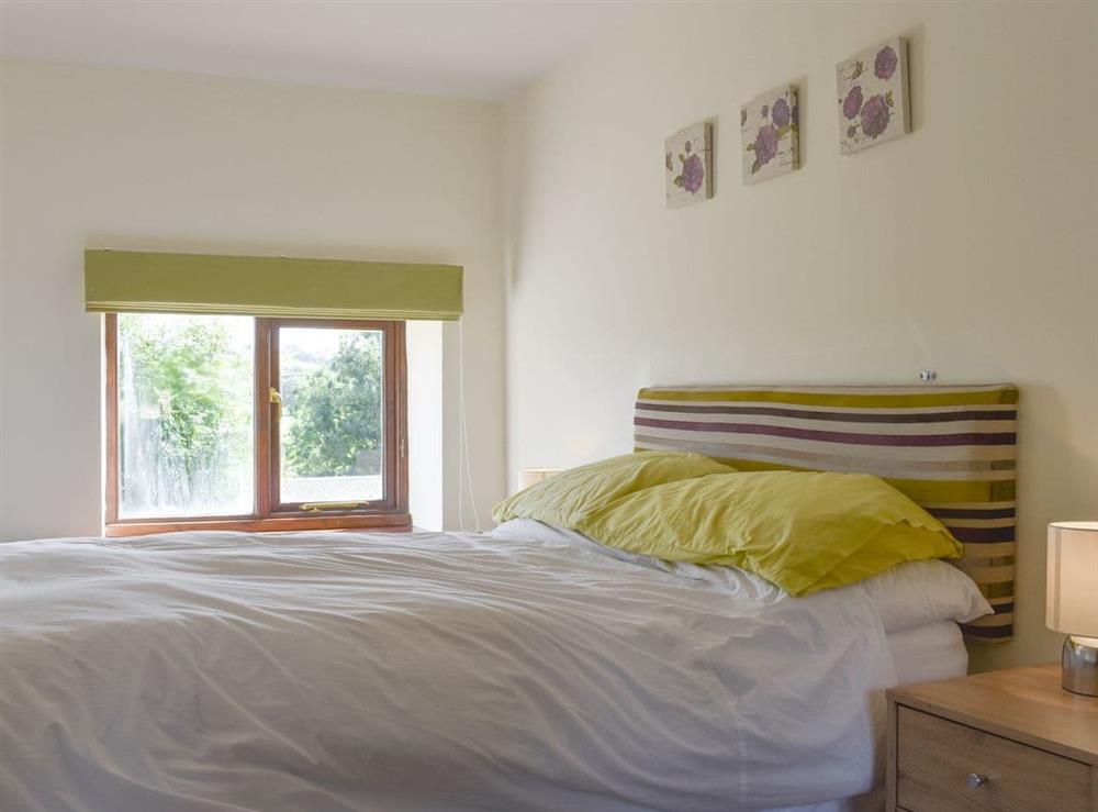 Relaxing double bedroom at The Old Dairy in Thorncombe, near Broadwindsor, Dorset, England