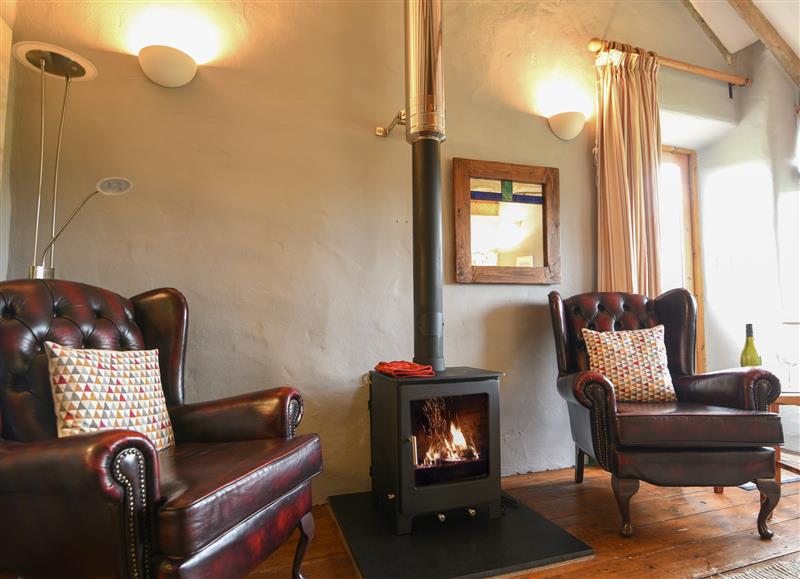 Relax in the living area at The Old Dairy, Whitchurch Canonicorum near Charmouth