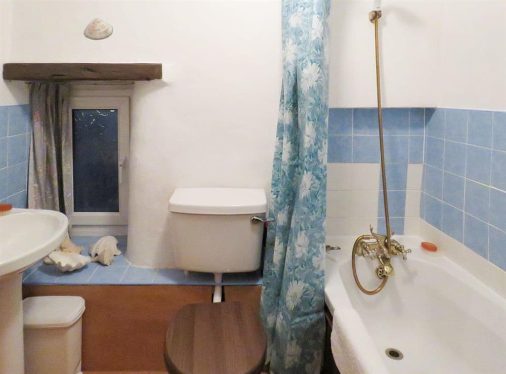 Bathroom with shower over the bath at The Old Dairy in Youlgreave, near Bakewell, Derbyshire