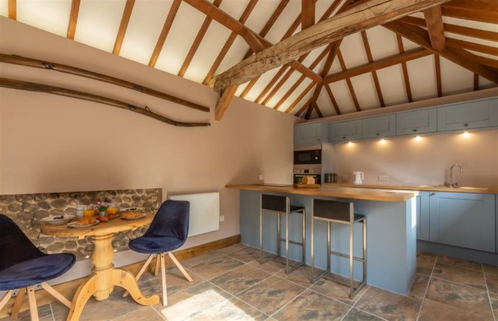 Ground floor: Kitchen and dining area (photo 3) at The Old English Barn and Cart Shed, Paston near North Walsham