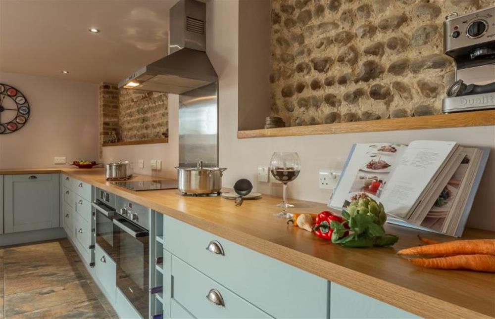 Ground floor: Kitchen at The Old English Barn and Cart Shed, Paston near North Walsham