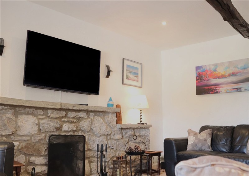 Relax in the living area at The Old Farmhouse at Brackenthwaite Farm, Yealand Redmayne near Arnside
