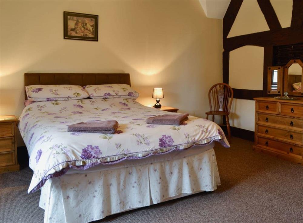 Double bedroom at The Old Farmhouse in Blakeney, Gloucestershire