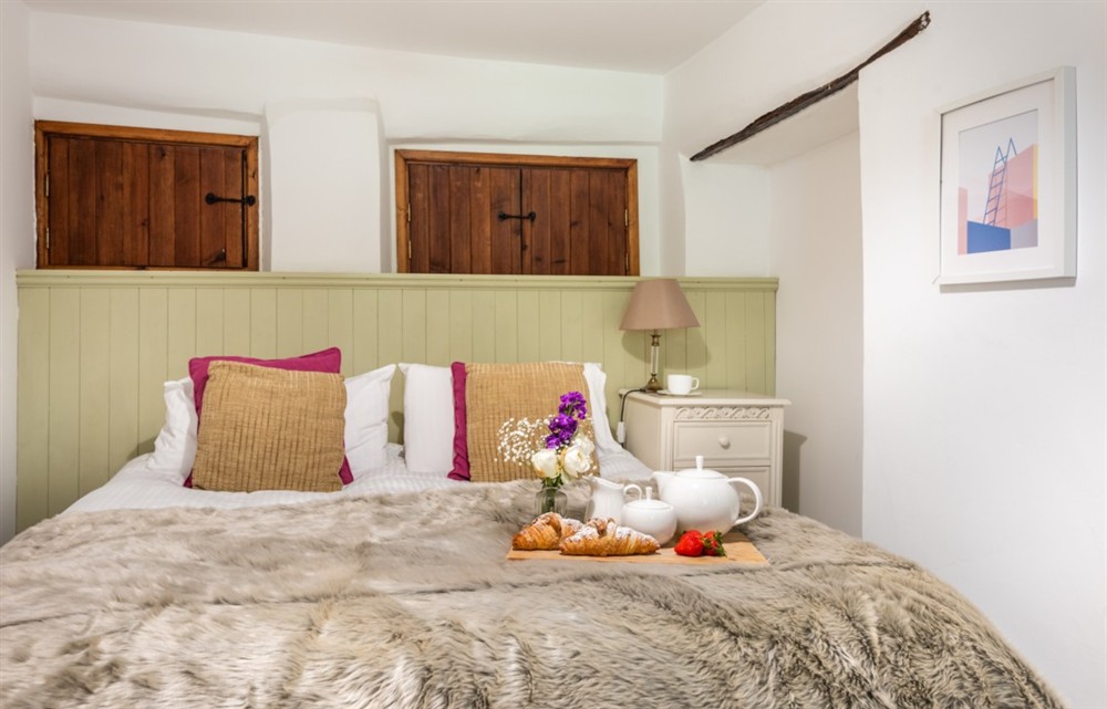 A bedroom in The Old Farmhouse (photo 3) at The Old Farmhouse in Combe Martin